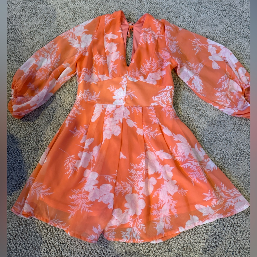 Francesca’s Vibrant Coral Romper